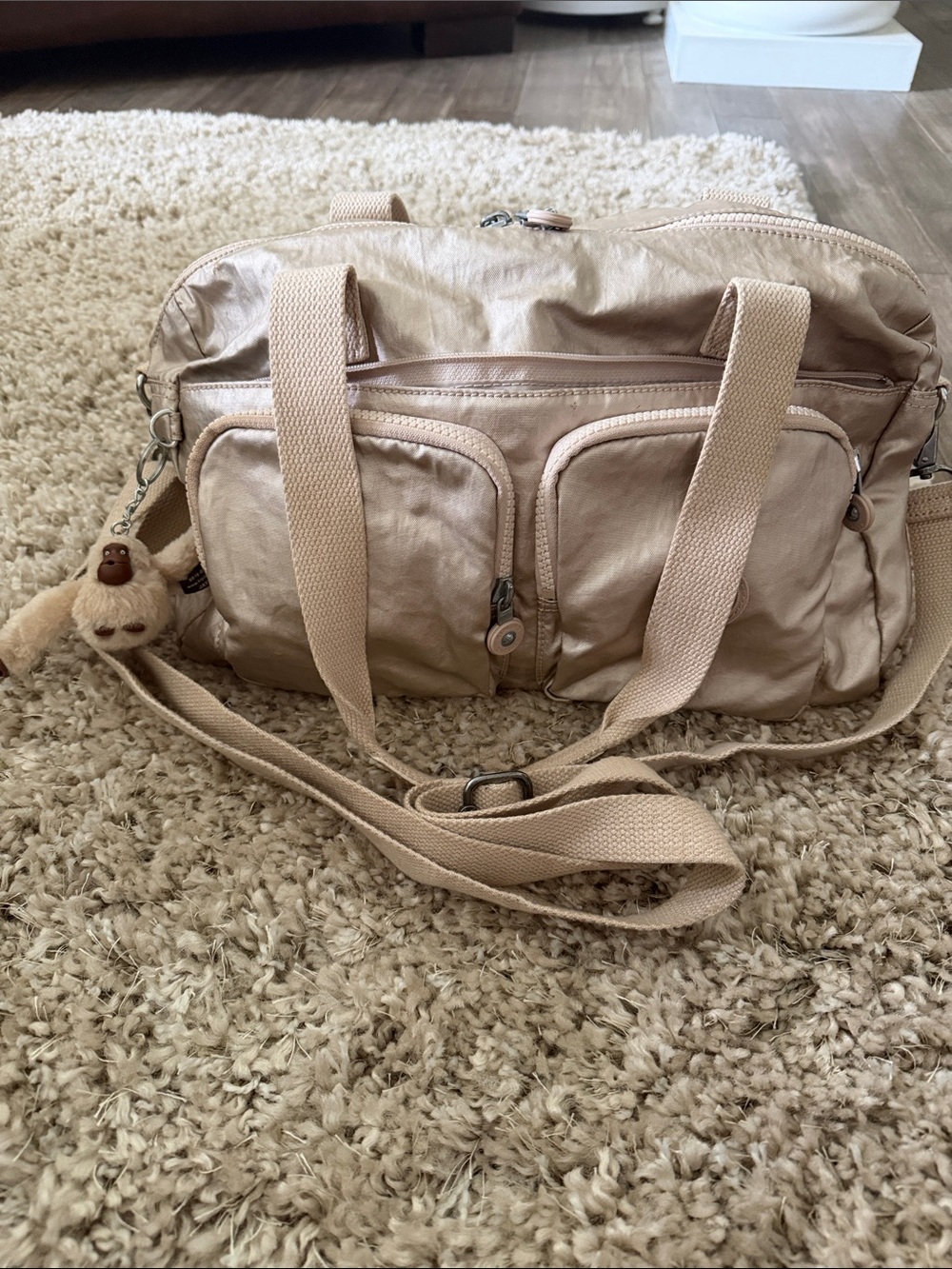 Kipling Light Beige Multi-Pocket Satchel with Crossbody Strap